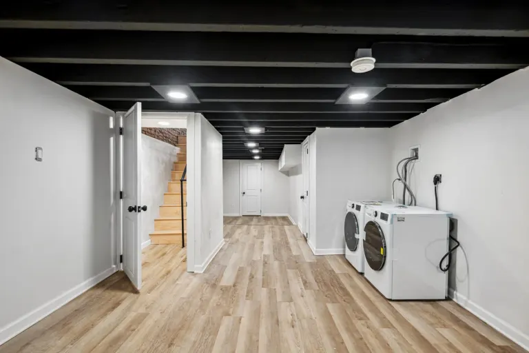 The finished basement and laundry area