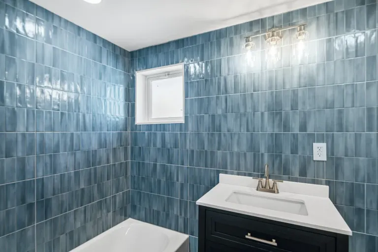 The blue bathroom and vanity