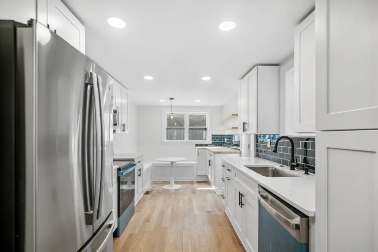 Kitchen cabinetry, worktops, and breakfast nook